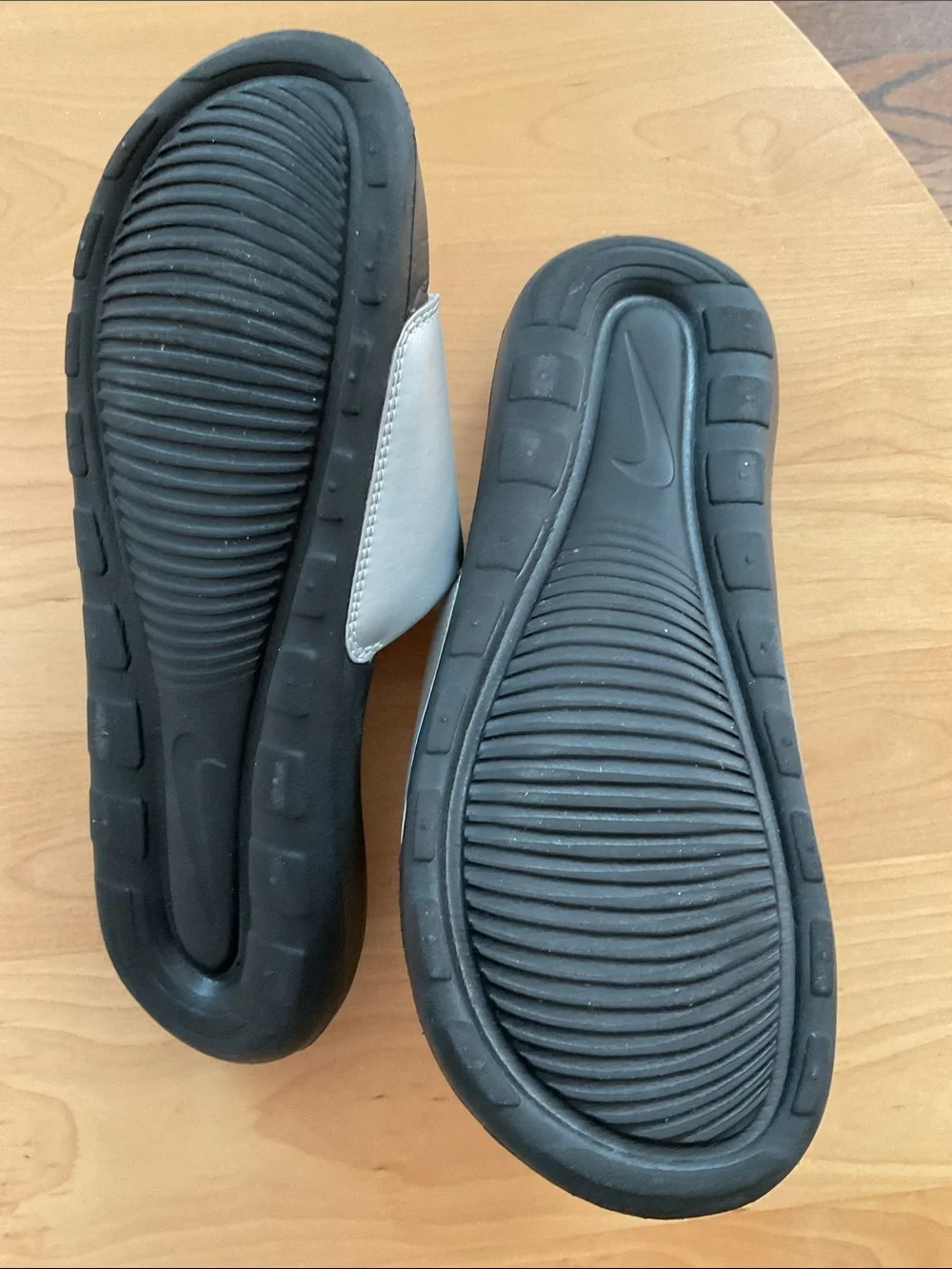 Nike Silver and Black Slide Sandals with Bold Logo